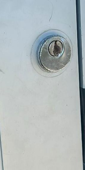 Failed mortise lock drilled out on a locked-out business on Amelia Island, Fernandina Beach FL 32034