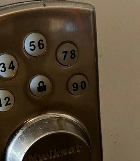 Kwikset keypad installed on a rental door after resetting the SmartKey cylinder on Amelia Island, Fernandina Beach FL 32034